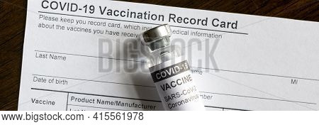 Covid-19 Vaccine Bottle On Coronavirus Vaccination Record Card, Panoramic Banner With Corona Virus V