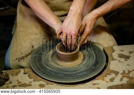Pottery Classes, Student Making Clay Pot On Wheel. Close-up Of Dirty Hands, Sculpting Clay Crockery