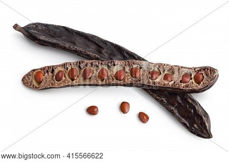 Ripe Carob Pods And Bean Isolated On White Background With Clipping Path And Full Depth Of Field