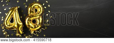 Golden Foil Balloon Number Forty Eight. Birthday Or Anniversary Card With The Inscription 48. Black 