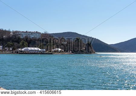 Beautiful View Of The Shore Of Lake Abrau In Early Spring. Picturesque View Of Embankment Of Lake Ab