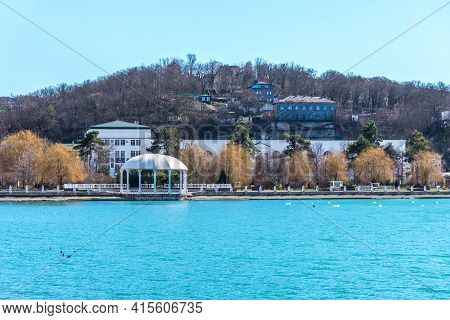 Beautiful View Of The Shore Of Lake Abrau In Early Spring. Picturesque View Of Embankment Of Lake Ab