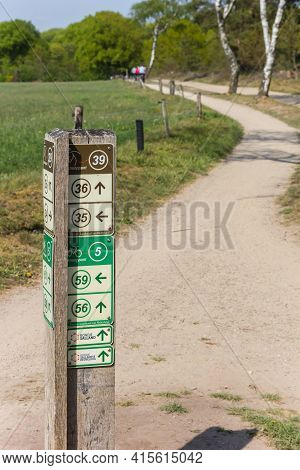 Salland, Netherlands - April 27, 2020: Direction Sign For Bicycle Tracks In National Park Sallandse 