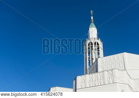Saint Roch Church In Bialystok City In Poland. White Catherdal Building. Empty Copy Space Blue Sky. 