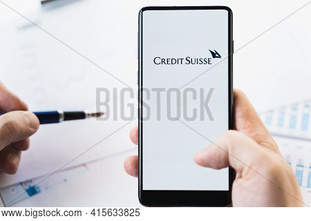 Russia Moscow 29.03.2021 Mobile Phone With Logo Of Credit Suisse Swiss Bank.investment Finance Compa