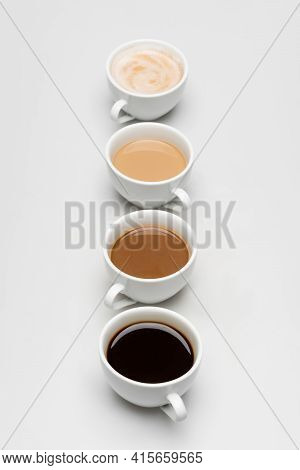 Different Freshy Made Coffee Drinks With Milk On White.