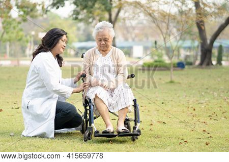 Doctor Help And Care Asian Senior Or Elderly Old Lady Woman Patient Sitting On Wheelchair At Nursing