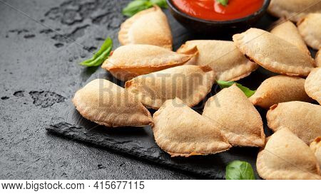 Margarita Margherita Pizza Parcels Pockets Filled With Tomato, Mozzarella Cheese And Basil Served On