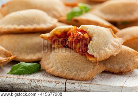 Margarita Margherita Pizza Parcels Pockets Filled With Tomato, Mozzarella Cheese And Basil Served On