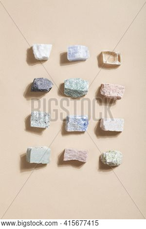 Many Crystal Minerals On Beige Background. Magic Rock For Crystal Ritual, Witchcraft, Spiritual Prac