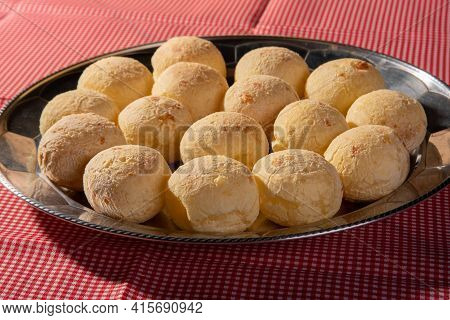 Cheese Bread, Round Shape Filled With Cheese Bread That Has Just Come Out Of The Oven On A Checkered