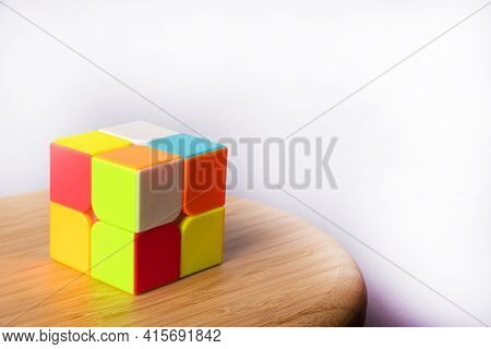 Araras, São Paulo, Brazil, April 4, 2021, Magic Cube Easy Level On Wood, White Background, Selective