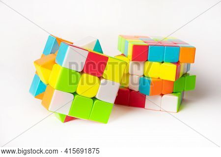 Araras, São Paulo, Brazil, April 4, 2021, Two Magic Cubes With White Background And Shadow, Selectiv