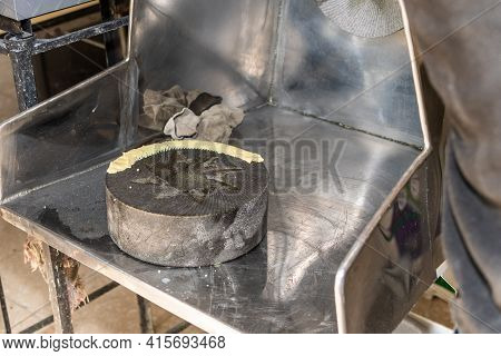Mill Being Prepared To Take Out Dough. One Of The Stones Brings Muddy Mass On It