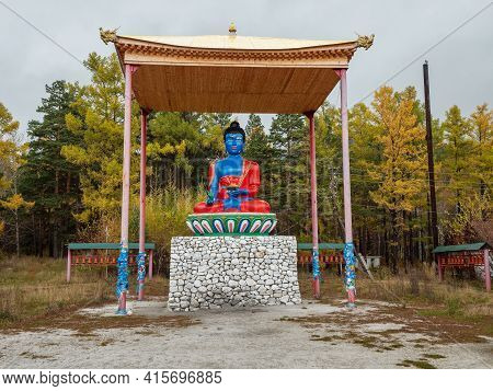 Eastern Sayans, Buryatia. Statue of the Buddha of Medicine on the territory of the sanatorium in the