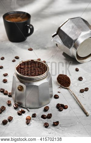 Moka Pot Filled With Ground Coffee, Close-up, Selective Focus, Gray Minimalistic Neutral Background.