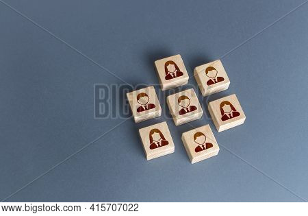 An Ordered Set Of People On Blocks. Combining To Achieve A Goal. Unity. Teamwork Cooperation. Autono