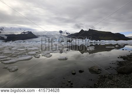 Fjallsarlon / Iceland - August 18, 2017: Fjallsarlon Glacier Lagoon View With Ice Formations, Icelan
