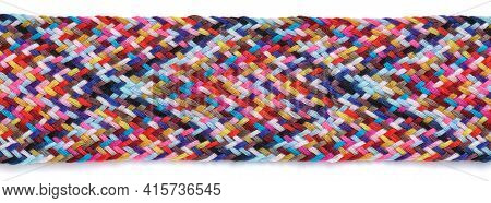 A Braid Of Multi Colored Sewing Threads On A White Background