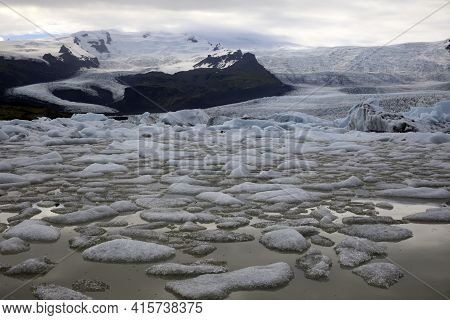 Fjallsarlon / Iceland - August 18, 2017: Fjallsarlon Glacier Lagoon View With Ice Formations, Icelan