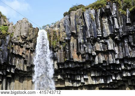 Skaftafell / Iceland - August 18, 2017: The Black Waterfall Of Svartifoss In Skaftafell National Par