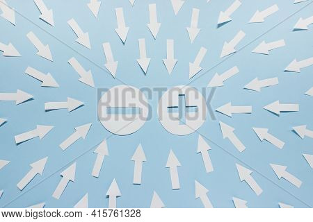 Simple Concept Of Attraction. Positive And Negative Charges With Many Pointing Arrows On Blue Backgr