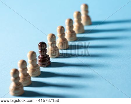 Chess Pieces In A Row, White Pawns On A Blue Background,