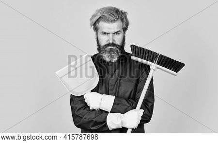 Garbage Removal. Cleaning Day. Janitor Professional. Bearded Hipster Blue Uniform With Broom. Garden