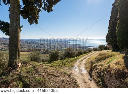 Aerial View Of The Lake Garda (lago Di Garda) With The Small Villages Of Bardolino, Cisano And Lazis