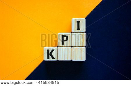 Kpi, Key Performance Indicator Symbol. Wood Cubes With Words 'kpi, Key Performance Indicator' On Ora