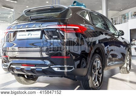Russia, Izhevsk - February 17, 2021: Haval Showroom. New Modern F7 Tech Plus Car In Dealer Showroom.