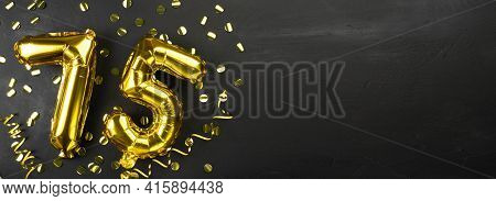 Golden Foil Balloon Number Seventy Five. Birthday Or Anniversary Card With The Inscription 75. Black