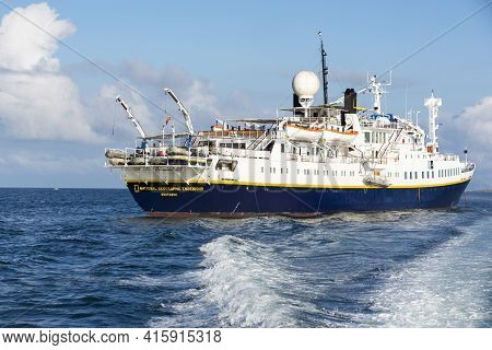 Puerto Ayora, Galapagos, February 13: National Geographic Endeavour Ship Seen Cruising In The Bay Of