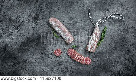 Fuet Catalan Dry Cured Sausage Cut In Slices. Traditional Spanish Fuet Thin Dried Sausage. Banner, M