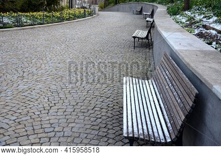 Retaining Wall At The Large Staircase In The Park Is A Flowerbed Area Planted With Rich Greenery Per
