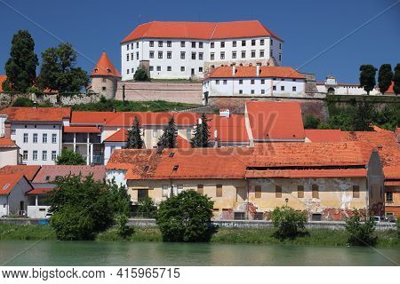 Ptuj Castle In Slovenia. Medieval Landmark Alongside Drava River In Ptuj.