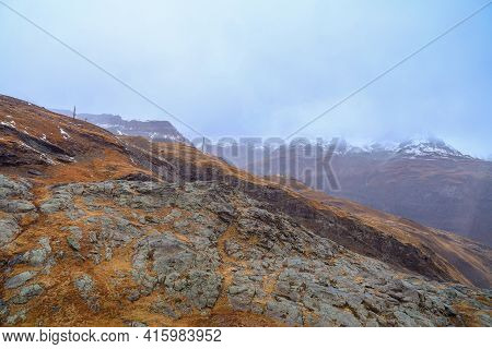 View Of Alp Mountain In Autumn Have Snow On Top Hill