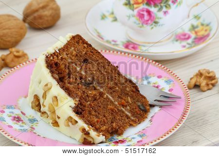 Carrot and walnut cake with marzipan icing, close up