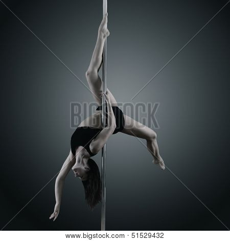 pole dancer, young woman dancing on pylon, toned and noise added