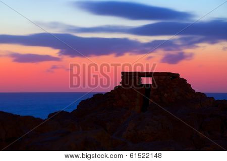 Ciutadella Menorca at Punta Nati colorful sunset in Balearic Islands