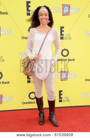 LOS ANGELES - NOV 17:  Gina Torres arrives to the P.S. Arts Express Yourself 2013  on November 17, 2013 in Santa Monica, CA                