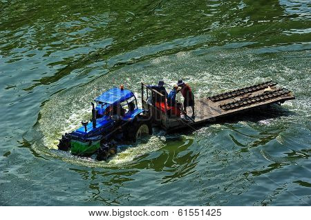 Tracter Drove On Flood In Bangkok