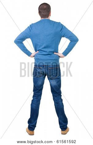 Back view of handsome man in blue pullover. Standing young guy in cardigan. Rear view people collection.  backside view of person.  Isolated over white background.
