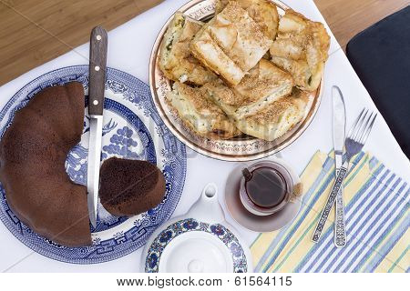 Borek And Chocolate Cake Served At A Party