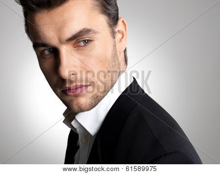 Closeup Face Of A Fashion Businessman In Suit