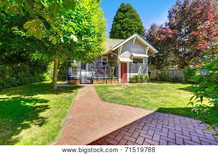 Backyard Garden With Brick Tile Walkway