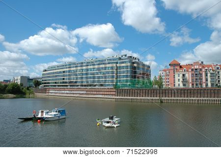 Boats And Modern Building At Warta River In Poznan, Poland