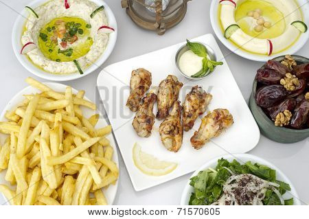 Arabic food presented on a table in a restaurant,
