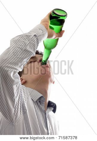 Young Man Drinks A Beer