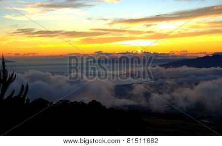 Maui sunset with misty clouds